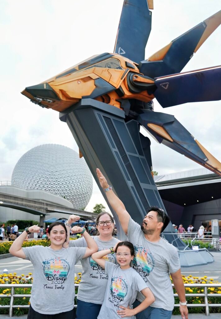 Lisa Tsang - Travel Planner with Kingdom Planners with family in front of Guardians of the Galaxy Cosmic Rewind